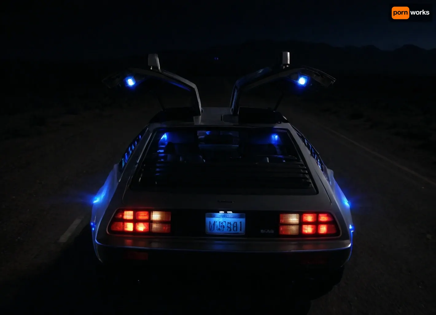 DeLorean from BTTF, (Back to the Future), Night, Dark Sky, Road in Desert, Real Road, Lights of DeLorean, (Travel Time Effects, Driving to 88mph, Blue Lights on Components Located on the Wings of the DeLorean, Blue Flash, Blue Flashes from the DeLorean), Blue Fire Flashes, Marty McFly Sits in the DeLorean and Drives it, Side View from Above, <lora:dark:.5>
