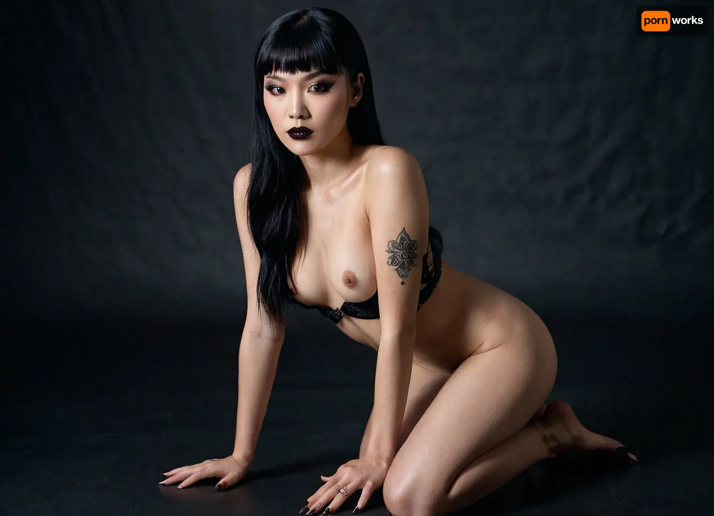 Actress Hana Mae Lee sensual figure, smooth glowing skin, brown eyes, blank semi-long hair, kneeling on a soft surface. Her back is slightly arched, hands resting on her thighs, a tattoo small at her left leg, a goth style makeup, black lipstick, black painted eyes, head tilted gently to the side with an alluring expression. Shot in a minimalist studio with dramatic lighting that creates subtle shadows across her body, ultra-detailed photorealism, perfect anatomy, lifelike detail, cinematic photography, 8K HDR..