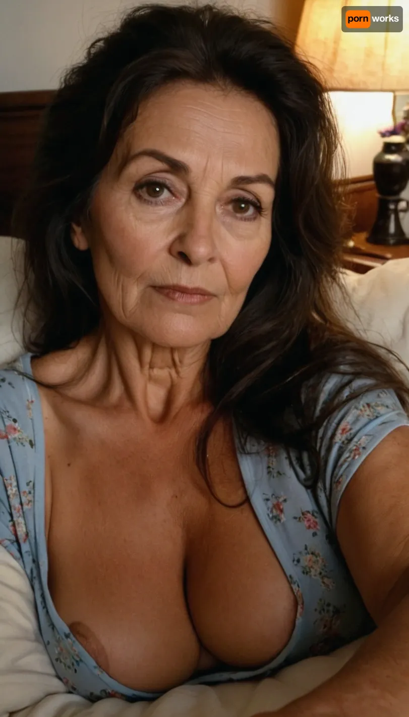 Sexy old granny, 65 years old, dark brunette, long hair, very tall, very curvy, small tits, very tiny boobs, wide shoulders, orgasm horny sexy face, in the morning, sleep face, messy hair, cute pj's, granny woman, looking at the camera, selfie, face focus