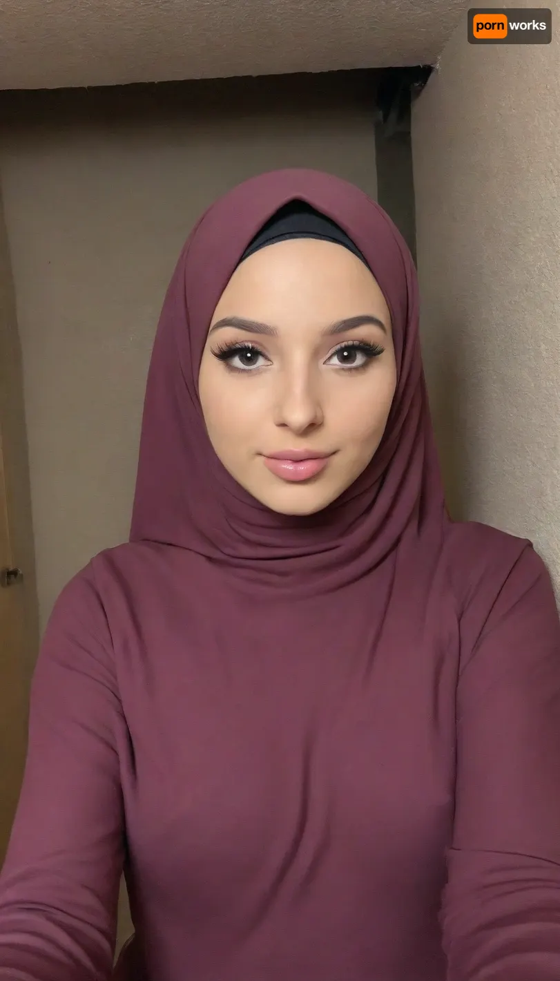This is a highly detailed selfie of a flat chested, (anorexic young muslim woman:1.4), close intimate angle shot, posing inside a small dark chamber in a dark basement. Her bodyheight is incredibly short. Her Hair is fully covered by her Hijab. Her skin is fair, and she has a soft, delicate complexion. She is dressed in a proper maroon hijab. She is also wearing a matching maroon abaya. Her abaya is very wide and loose and covers her whole body entirely. Her makeup is subtle, with a focus on her eyes, which are accentuated with dark eyeliner and mascara, and her lips are painted a soft pink. Fully clothed. playful tease. very small body, (small body:1.3), The background features a small chamber inside a dark tiny basement in an old building, creating a secluded space shielded from prying eyes. This concealed nook offers a sense of security and privacy.