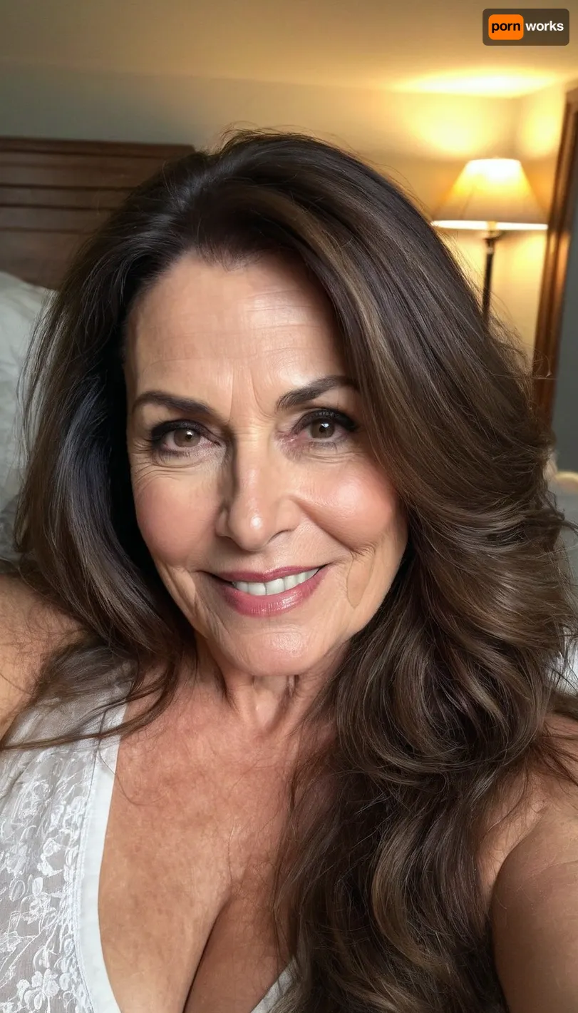 sexy mature, sexy 60 years old, brunette, long wave hair, chubby, cute smile face, huge black eyes, wide jaw, long big chin, tall, selfie, in the morning, after sleep, messy hair, sleep face