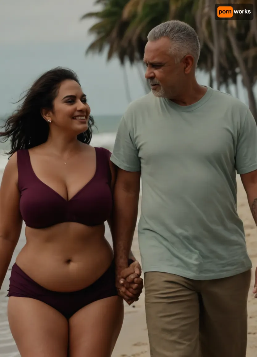 one negro built aged man with summer hawai open, (text written "sugar daddy honeymoon" on shirt), and shorts and buzz cut hair, one indian gorgeous oversized busty milf woman hourglass figure voluptuous with thick legs and massive bust and long straight hair wearing tight cropped top short sleeves tummy exposed clothed, couple, walking by beach daytime holding hands romantic she on the left side, in the middle of the screen, all eyes on viewer, all seducing smirks, detailed face, close up side view, after honeymoon fucking, photorealistic, <lora:clothed_small:.5>