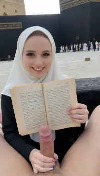 hijab girl, very hairy dick pov, smile, holding dick, reading quran, pale skin, skinny, in front of kaaba