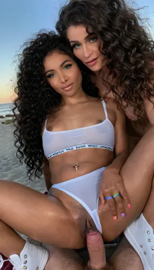 Masterpiece, two very little young petite innocent beautiful 21yo girl, (long dark wavy hair:1.6), blue eyes, (athletic:1.2), (small tits:1.2), skinny waist, bubble butt, perfect lips, athletic legs, extreme crotchless micro bikini, white sneakers, at the beach, pov, (huge penis:1.1), she sits on tip of my dick, tip of cock jerking pussy, (the tip of the cock slightly spreads her labia), (dark pubic hair strip), behind her sister grabbing her tits, nipple piercing, (clitoral piercing), navel piercing, (2girl), perfect open pussy, perfect clitoris, perfect face with rainbow makeup, cock ring, (transparent white condom), oiled body, extremely high image detail, 8k, (((100% prompt)))