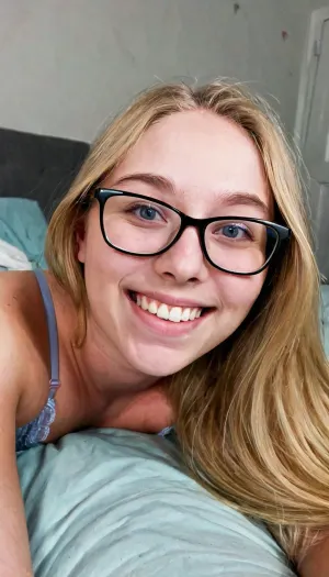 candid photo, confident 18 year old girl, lingerie, soft body, babyfat, small breasts, flat chest, long blonde hair, ((wide jaw)), ((big chin)), thin lips, big nose, eyeglasses, small body, she is laying next to you in bed, someone else in bed off-screen, dark pastel colored bedroom, cute smile, ultimate realism, poor lighting, at night, dark, night, realistic detailed skin texture, focus on realistic face, stunning eyes, skin pores, ultra realism