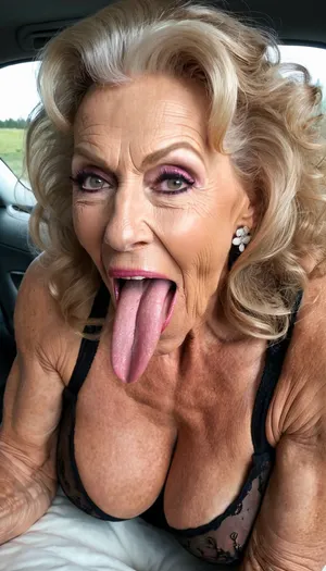 smile skinny brigitte nilsen old granny, smile gilf streches out her extreme long tongue, usa pervert old bodybuilding muscle woman gilf with long tongue, massive boobs, open her mouth big, waiting for cumshot, in bed, smokey, lipstick, ginger kinky curly hair cut, with very massive tits hugh boobs, sticks her extreme long tongue out of her mouth, big open mouth, in a car, wearing a silver pink rose transparent diamant silver tight sweater with tits free hole, hairstyle after sex, make up running down, kinky crazy granny