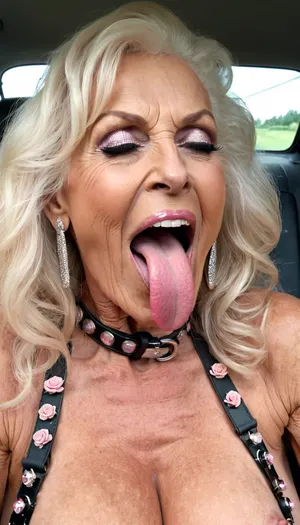smile skinny brigitte nilsen old granny, smile gilf streches out her extreme long tongue, usa pervert old bodybuilding muscle woman gilf with long tongue, massive boobs, open her mouth big, waiting for cumshot, very wet and very long hair, smokey, lipstick, ginger kinky very long curly hair cut, with very massive tits hugh boobs, sticks her extreme long tongue out of her mouth, big open mouth, in a car, wearing a silver pink rose transparent diamant silver leather bodyharness, hairstyle after sex, make up running down, kinky crazy granny