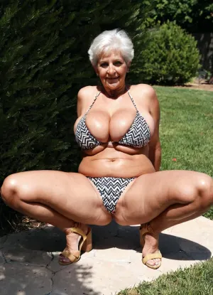 Common stacked grandmother wears tight bikini with larges geometric patterns, uninhibited, exhibitionist, very hot granny, real ordinary grandmother, perfect curvy body, outdoor casting pose, on the ground
High quality photo, photo booth, portrait, close-up