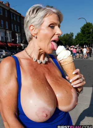 Very busty 70 years old skinny grandmother loves licking a giant icecream, extra large oversized siliconed boobs, real massive oversized tits, real grandmother style, fake jewels, street background
High detailed photo, flash photo, selfie, profile portrait