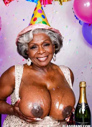 Stacked old black grandmother got oversized massive breasts takes the pose, real lusty granny, perfect face and body, exposed wrinkled face, uninhibited granny, party hat, birthday party background, champagne bottle High detailed photo, high quality photo, portait, photo studio, different angles view