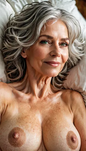 a curvy 69 year old english woman with tousled shaggy messy grey hair and green eyes and big breasts and pale skin and no makeup lying prone on bed, perfect eyes, topless, smiling, perfect nipples, side view, highly detailed, cleary see face, beautiful, delicate, pale skin, golden hour, digital painting, artstation, concept art, smooth, sharp focus, illustration, art by artgerm and Greg Rutkowski and alphonse mucha