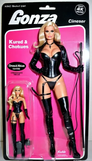 The woman in the picture is wearing a dominatrix barbie doll outfit with a leather micro panties, leather high heels boots, and a whip. She has long blond hair and dark eyeliner. She is standing next to the packaging of the picture