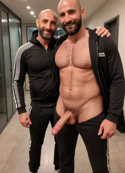 2 men. Full body photo., ((A sexy man, 40yo syrian, bald head, full long beard, beautiful face, smiling, wearing shiny black tracksuit, jacket open presenting his muscular hairy chest, pants pulled down exposing his 12-inch long soft uncut penis.)), ((Next to him stands another man, slim, young, blond-haired, german, touching the 1st man's belly.)), on a busy London walkway at night, perfectly natural skin, perfect hands, handslora, @hrypctls1, hairy, chest, shot with flash, harsh lighting, dramatic contrasts, <lora:xpenis-1.5e:.8>, <lora:590198_training_data:.5>, <lora:@hrypctls1.v1.concept.sdxl_epoch_3:.2>