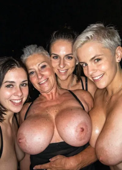 Ordinary old grandmother likes to show her very massive breast, real grandmother style, perfect body and face, surrounded by her young besties, love, shaved haircut, dark street, at night High quality photo, high detailed photo, flash photo, close selfie