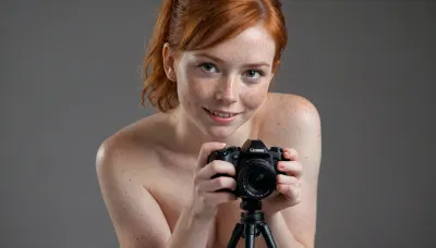 (ultrarealistic photography), (full body view), A naked female photographer with a camera is taking a photo from viewer, short ginger hair, ponytail, freckles, realistic detailed face, visible vagina, visible labia, cinematic, perfect photography, professional smile