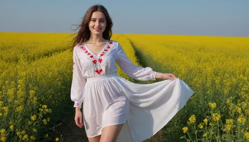 captivating young 5-feet brunette Ukrainian girl, smiling, desirable big breasts and thighs, traditional fine fabric loose-fitting snow-white embroidered extra long Ukrainian blouse and skirt covering knees on completely bare body, barefoot, clear blue sky, lush human-height canola intensely blooming, sunrise