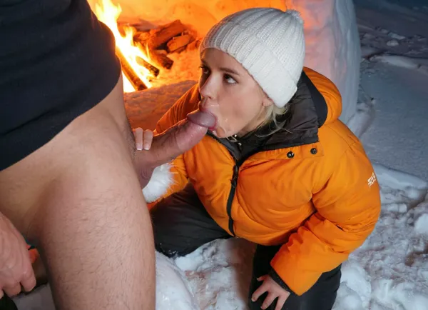 A highly detailed, photorealistic scene inside a dimly lit igloo. A pretty 19 yo girl is kneeling on the packed snow floor near the center, deepthroating with great passion and dedication the large cock of her father's best friend, illuminated by the warm glow of a small, contained bonfire. She wears warm, fur-lined clothing suitable for a cold environment. An older man stands next to her, pressing his huge cock deep into her mouth, dressed in similarly rugged attire, his face gently lit by the flickering firelight. The texture of the igloo’s ice blocks should be clearly visible, reflecting subtle hints of orange and yellow from the flame. A lot of cum is dripping from her mouth as she can't swallow all of it, The image should convey a quiet, intimate atmosphere, with soft shadows and realistic proportions.l, 4k, photorealistic, intricately detailed face, <lora:SDXLHighDetail_v5:.5>