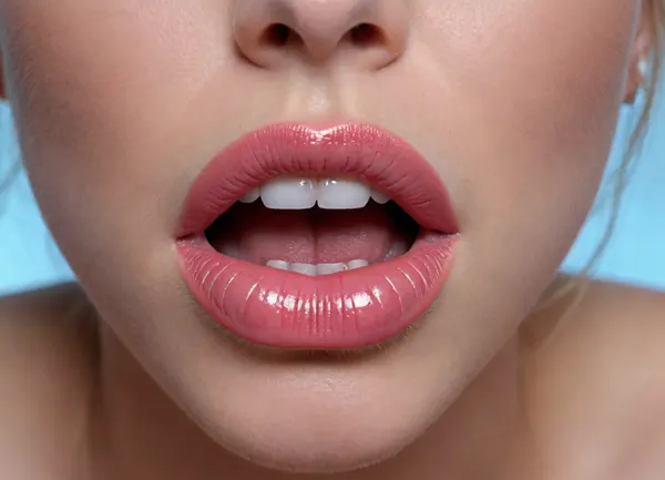 Huge juicy silicone female bimbo lips, high gloss lipstick, doe eyes, extremely closeup, Extremely detailed, blue eyes, licking, extremely beautiful woman