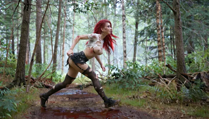 [girl runs away through the forest from several horny werewolves], partially torn clothes, scratches on the skin, small tits, ideal tits, perfect boobs, running, long red hair, [her breasts are visible through her torn blouse], two werewolf and a woman, her litle torn skirt, her dirty skin, werewolf is not much taller than the girl, black stockings, black garter belt, full body view, wet skin, torn shirt lifted up, multiple traces of bloody scratches side view, unsuccessful attempt to defend against the werewolf, perfect hands and fingers, high definition, ultra realistic, (torn clothes), <lora:JustCum:.8>, <lora:Facials:.5>, <lora:580159_training_data:1>